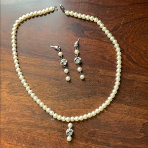Matching pearls and crystal earrings and necklace